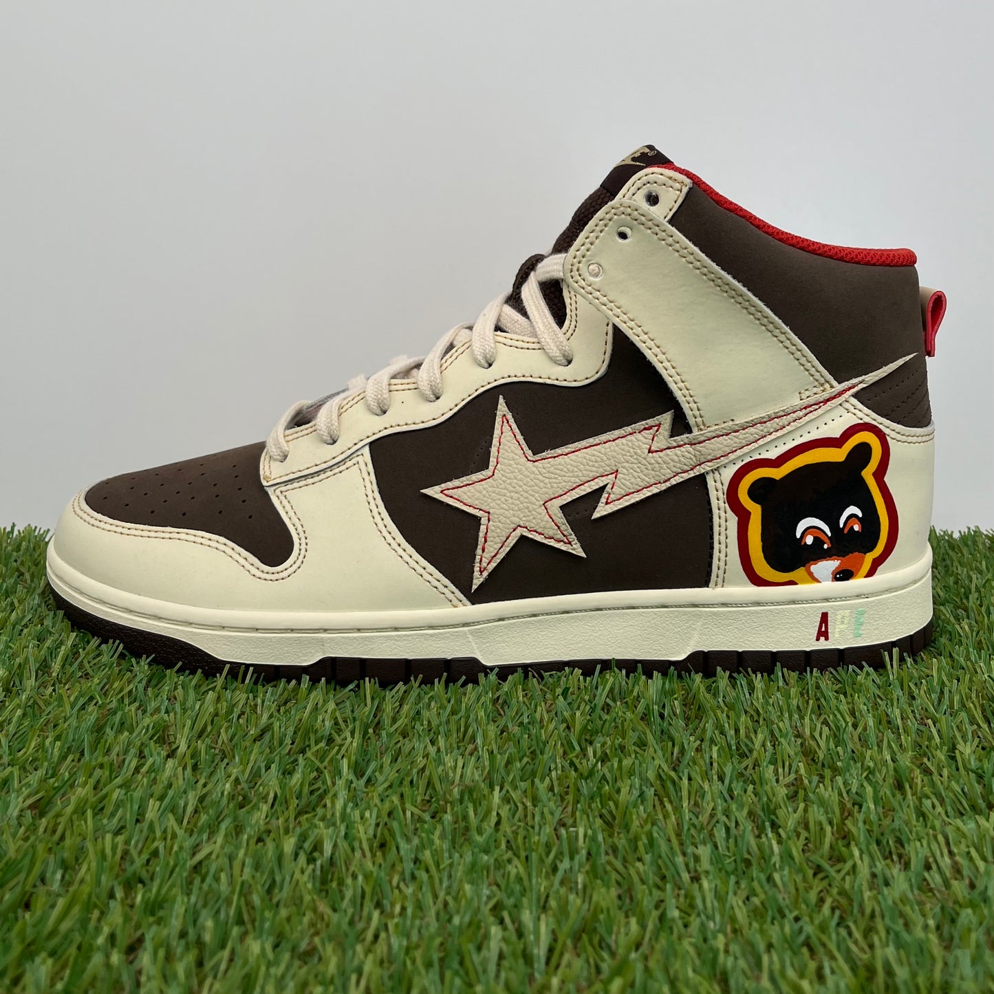 Dunk hi college dropout bapesta